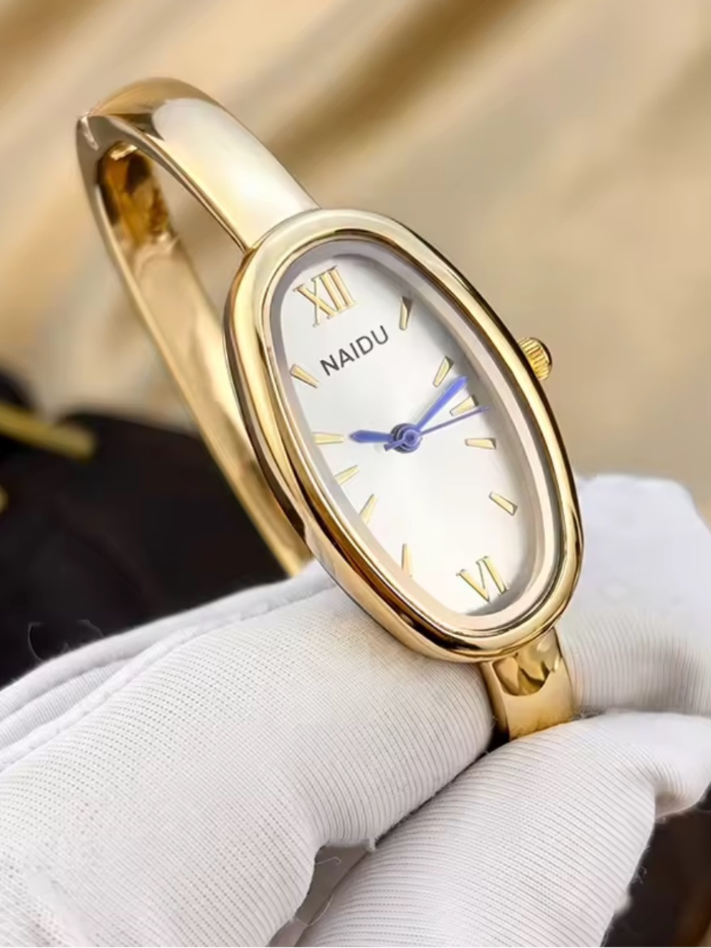 NAIDU Gold-Tone Oval Bangle Watch for Women - White Dial